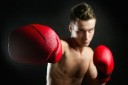 young shaped man boxing