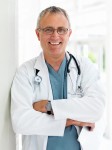 Smiling senior doctor with stethoscope